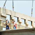 2men cutting rebar